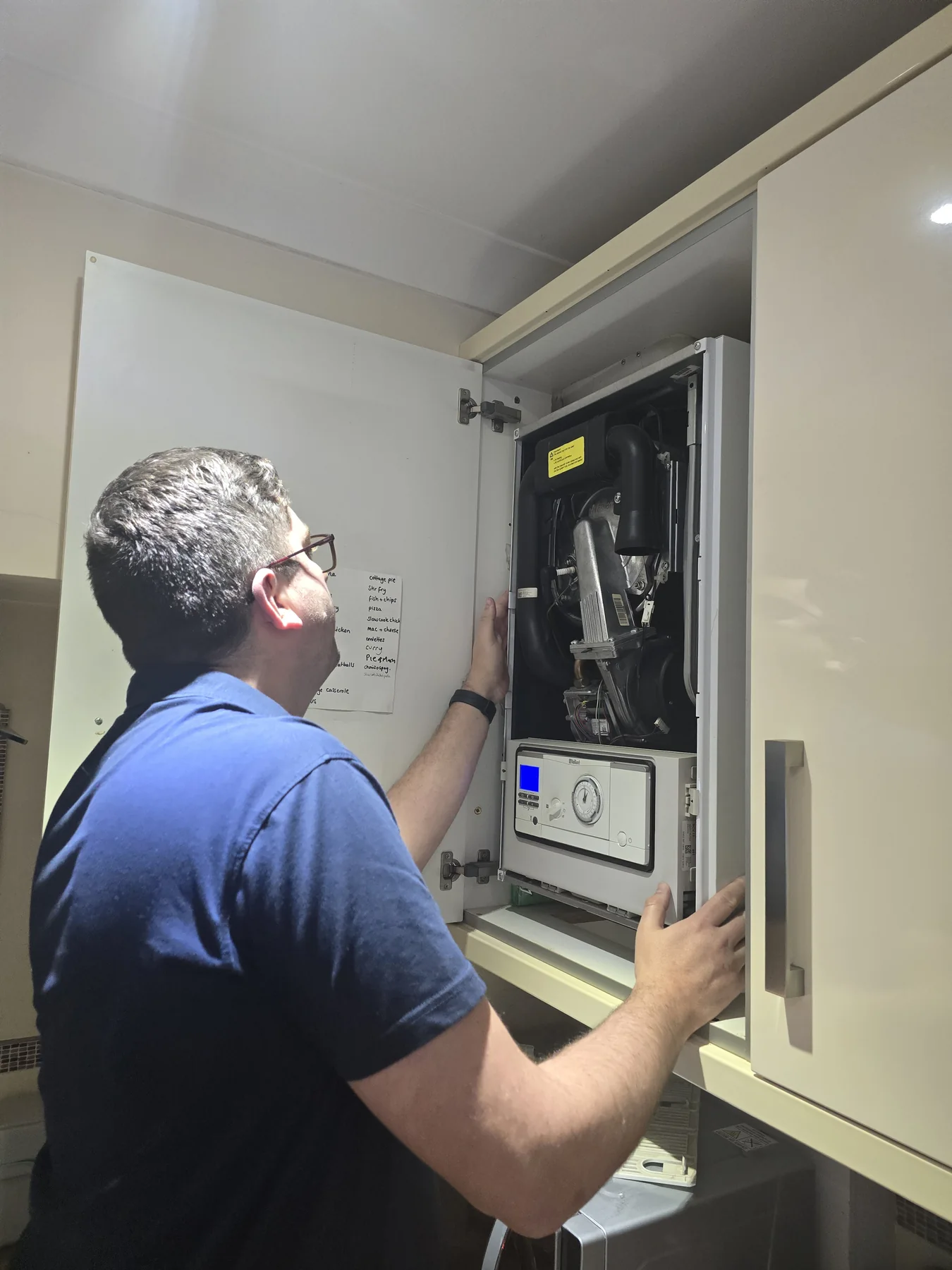 Hands-on inspection inside a boiler