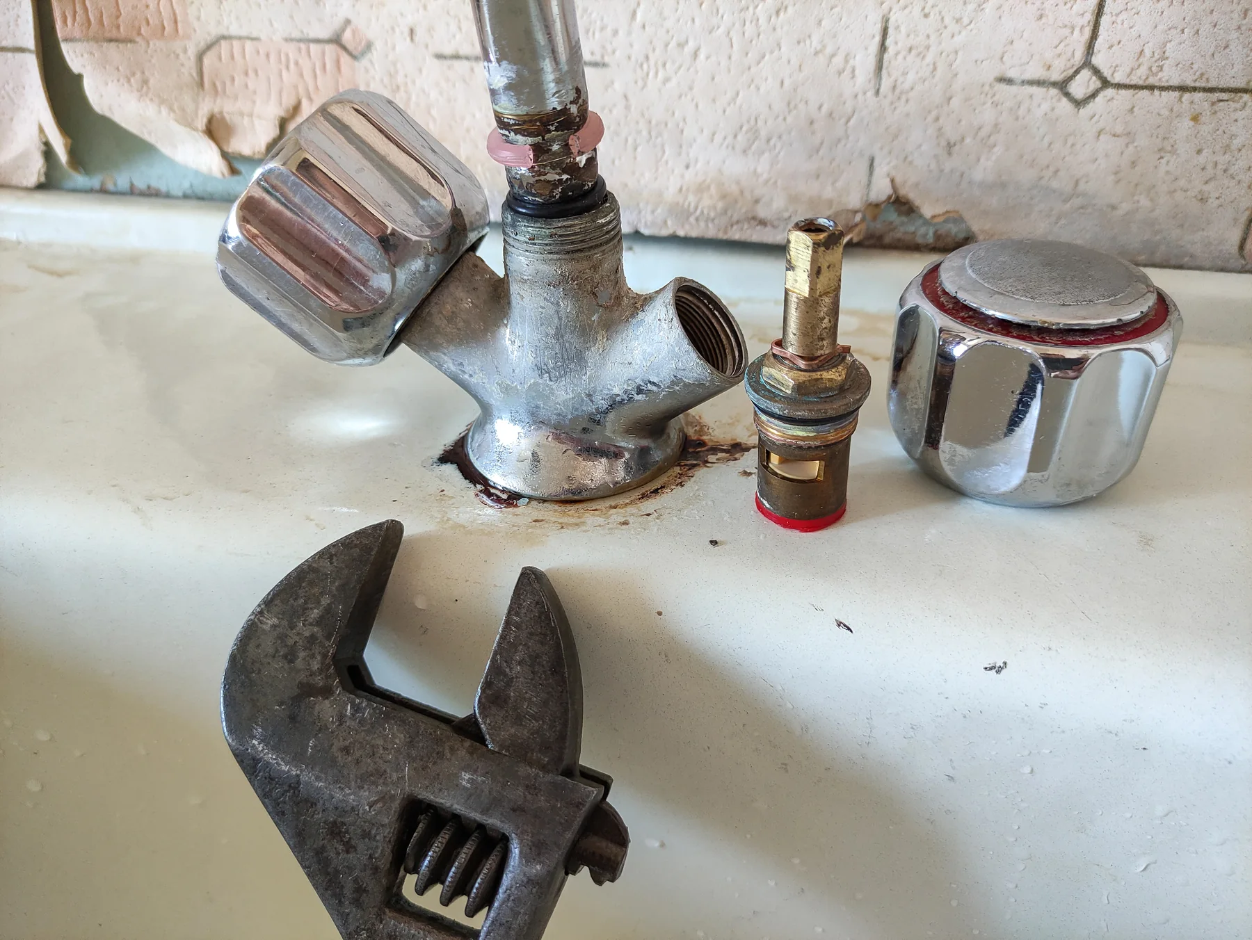 Tap components being repaired
